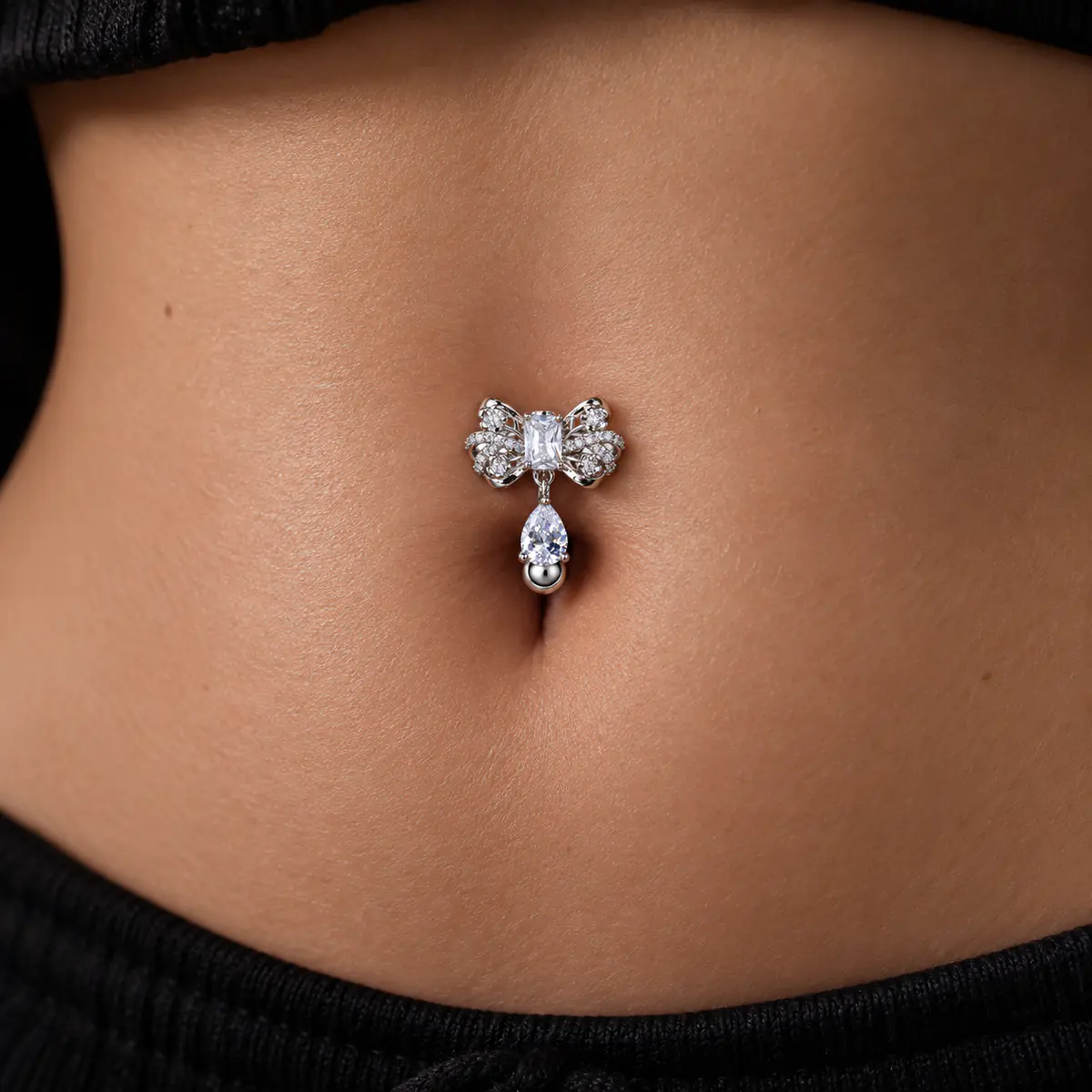 Reverse Bow Belly Button Ring, CZ Teardrop Dangle Navel Ring, External Thread Y2K Piercing Jewelry for Women - wearing view