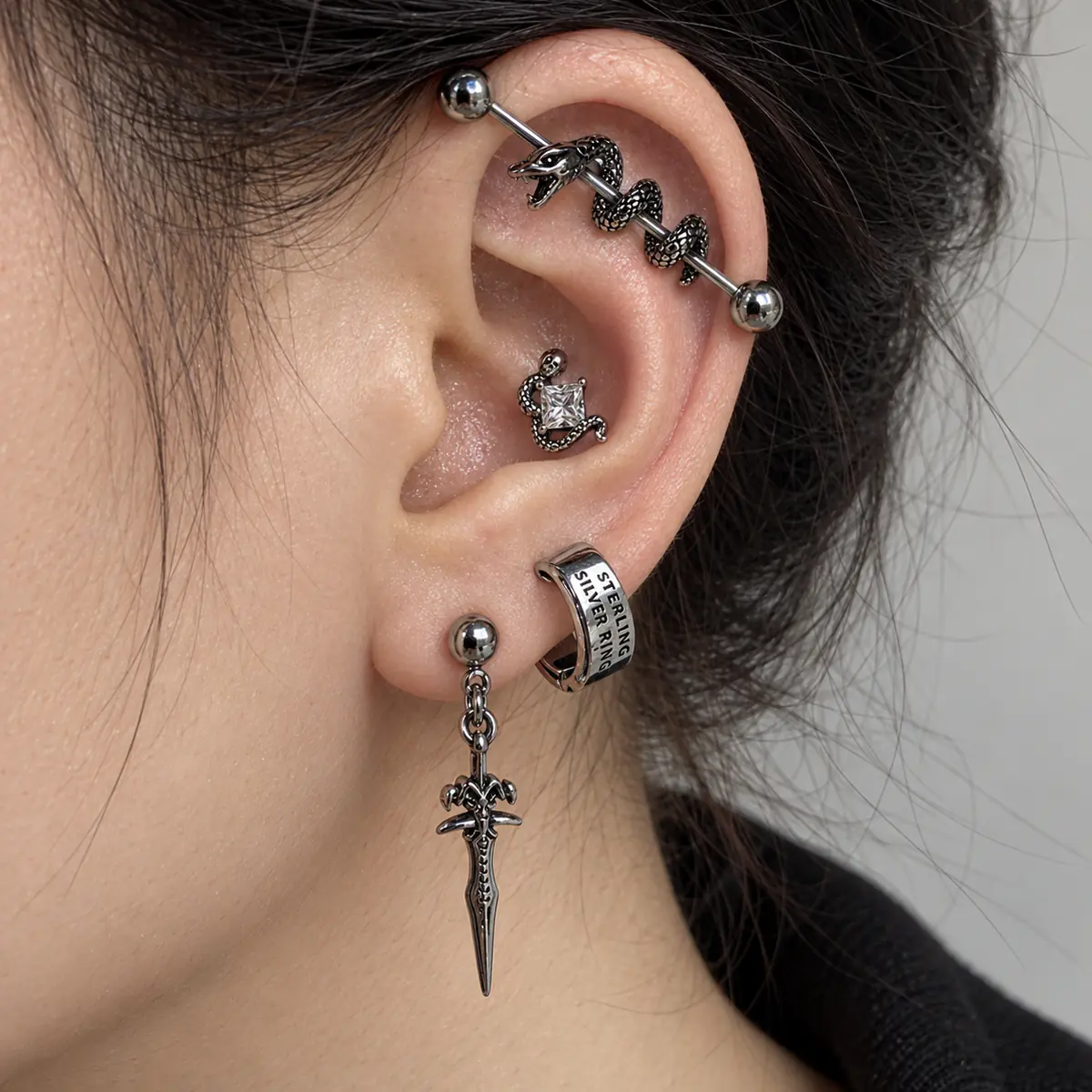 4Pcs Dark Snake Titanium Steel Ear Piercing Set, Cartilage Stud, Ear Bar Conch, Sword Dangle Hoop Earrings, Edgy Cool Jewelry - wearing view