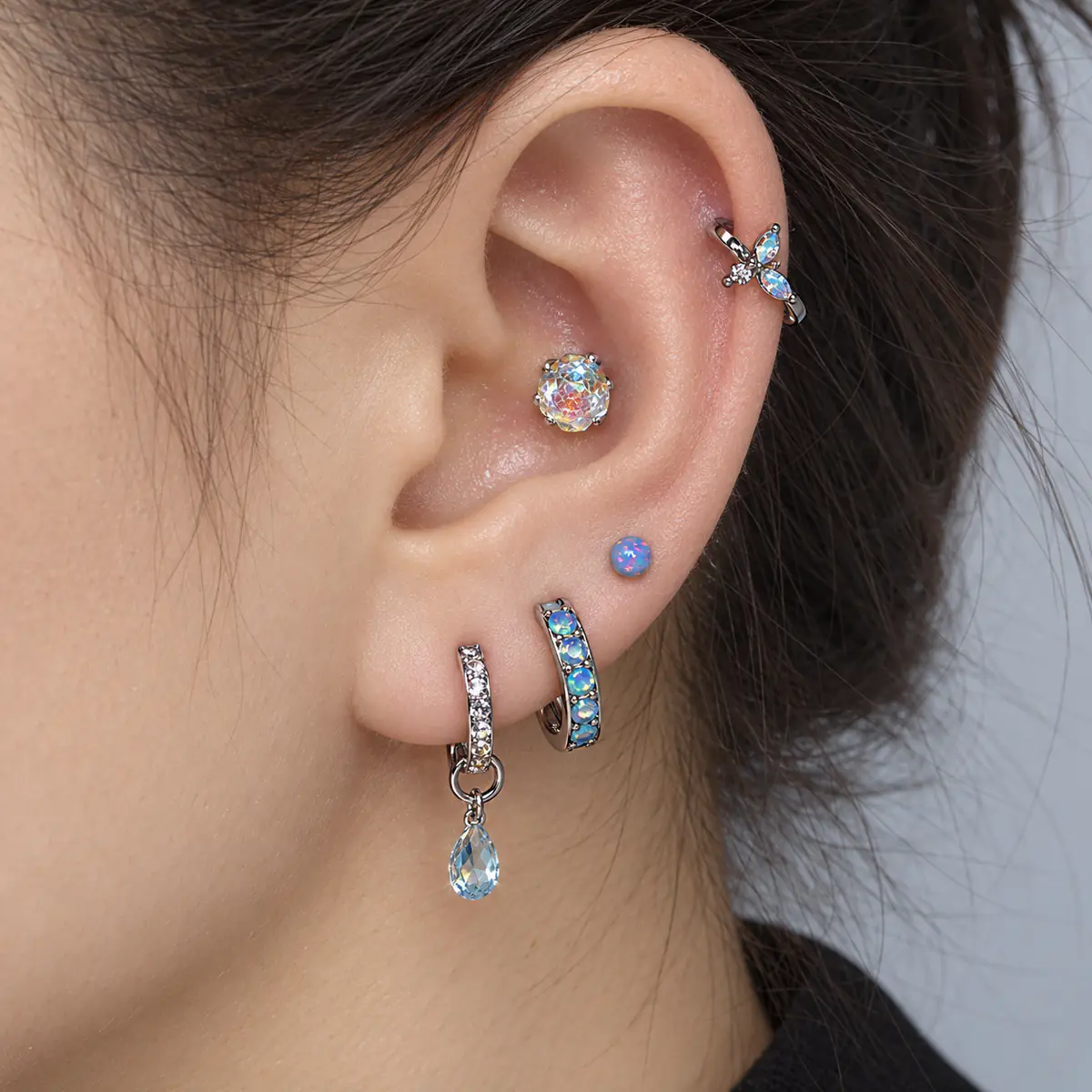 5Pcs Blue Opal Titanium Steel Ear Jewelry Set, Iridescent Butterfly, Light Blue Drop, Sparkling Rose, Hoop Ear Cuff & Cartilage Stud Premium Earrings - wearing view