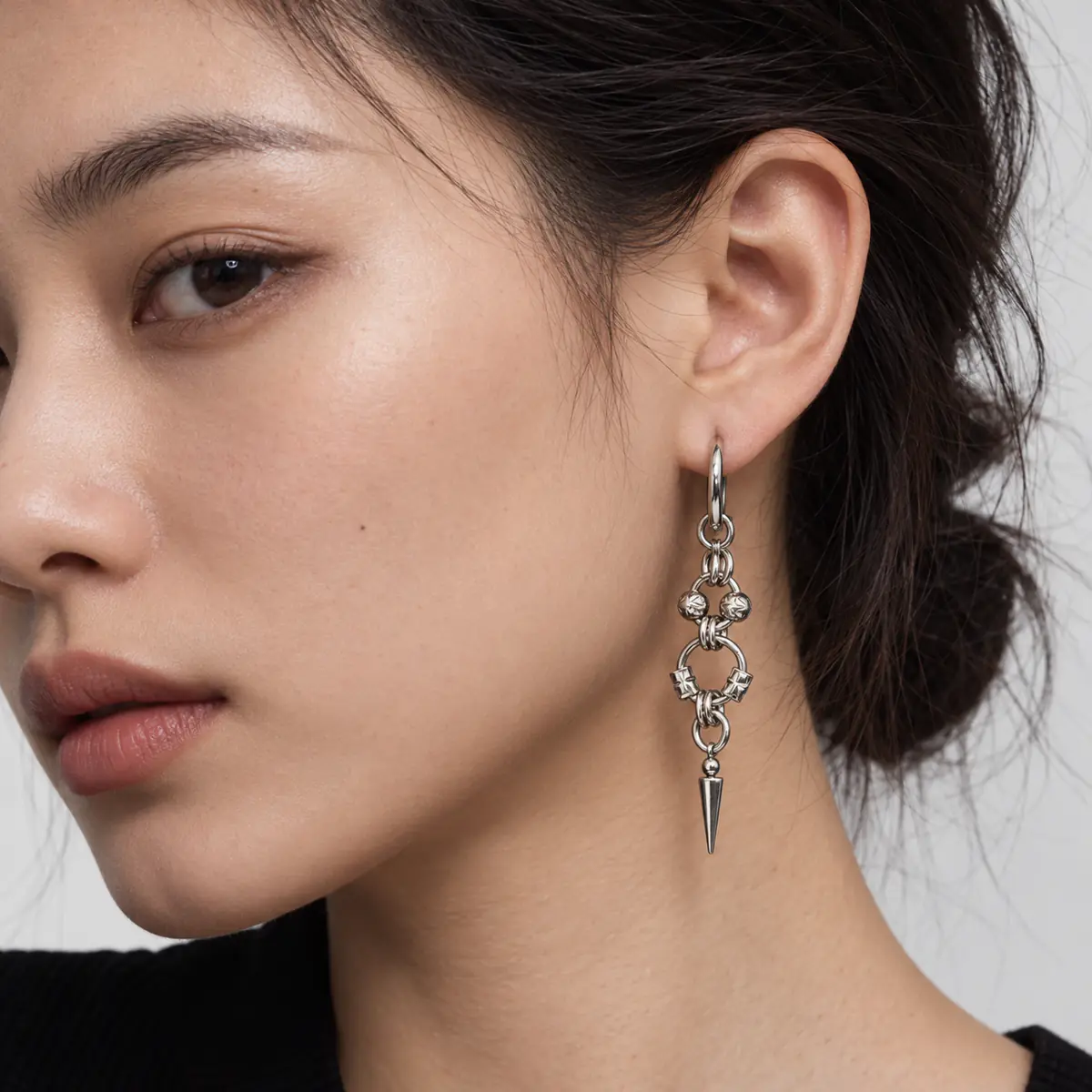 Heavy-Duty Retro Punk Drop Earrings, Wrapped Bead Chain Rivet Cone Design, Industrial Edgy Women's Ear Jewelry - wearing view